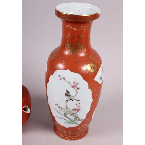 60 - A Chinese baluster vase, decorated panels of birds and flowers, 11 3/4