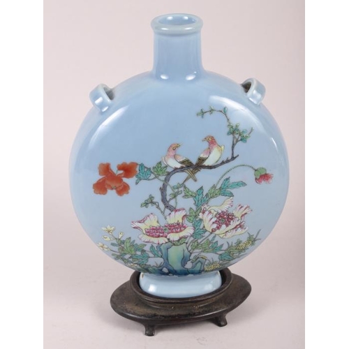 63 - A Chinese moon flask with famille rose decoration of birds and flora, 9 1/2