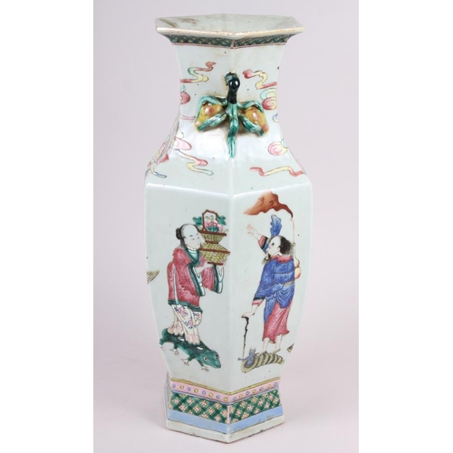 67 - A Chinese porcelain hexagonal famille rose vase with immortal decoration, 16.5