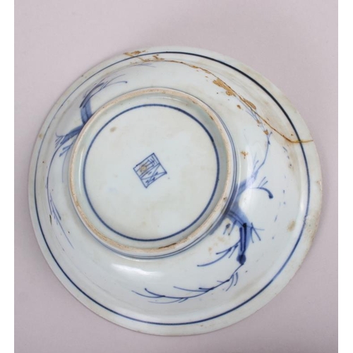 69 - A Chinese tea bowl decorated with cranes, three pieces of Chinese export blue and white china and an... 