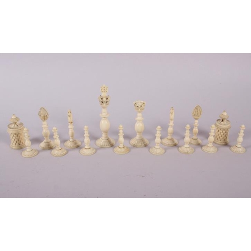 78 - A 19th century Indian turned ivory and horn chess set, king 4 1/2