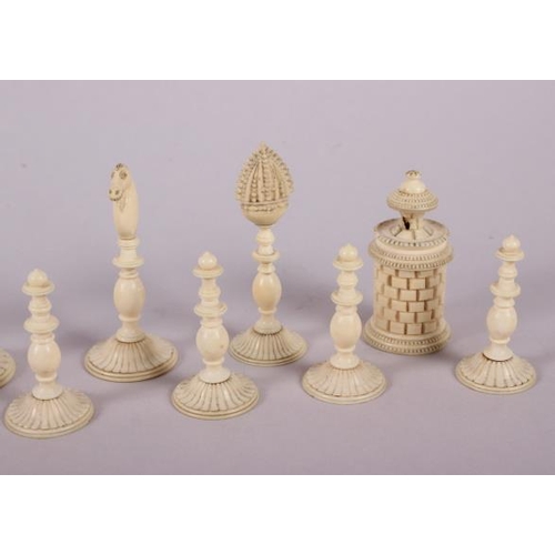 78 - A 19th century Indian turned ivory and horn chess set, king 4 1/2