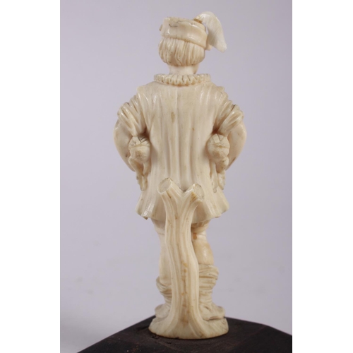 79 - A 19th century Dieppe ivory carving of a gentleman with two geese, on plinth base, 4 3/4