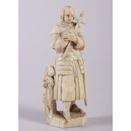 79 - A 19th century Dieppe ivory carving of a gentleman with two geese, on plinth base, 4 3/4