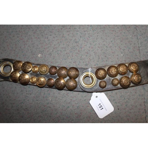 151 - A sectional leather strap mounted with numerous WWII brass buttons, including RASC, Royal Engineers ... 