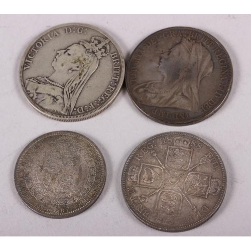 305 - A Victorian silver crown, dated 1889, another dated 1900, a double-florin, dated 1888 and a half-cro... 