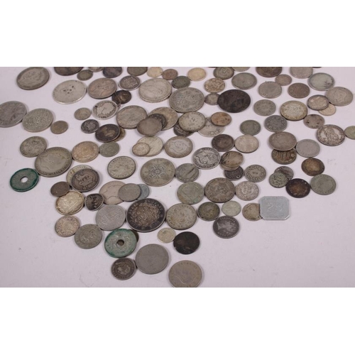 307 - A collection of mainly British silver and white metal coinage, together with similar world coins