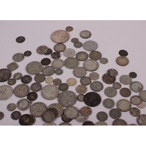 307 - A collection of mainly British silver and white metal coinage, together with similar world coins