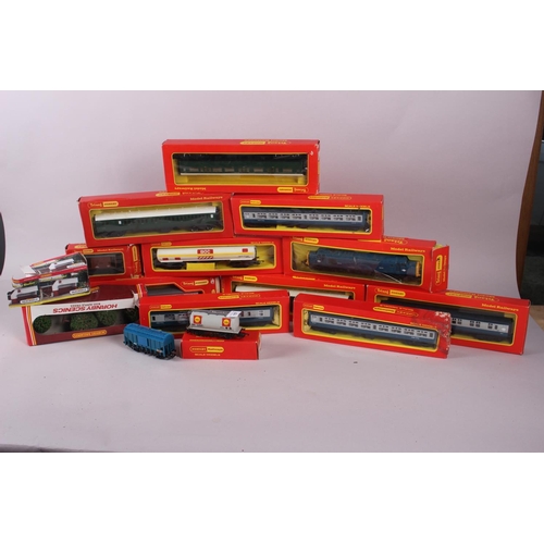 157 - A large collection of Hornby OO gauge model railway carriages, track and accessories, mostly boxed