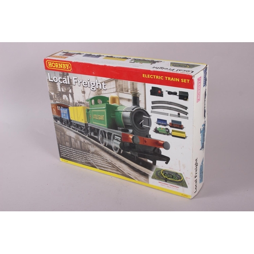 157 - A large collection of Hornby OO gauge model railway carriages, track and accessories, mostly boxed