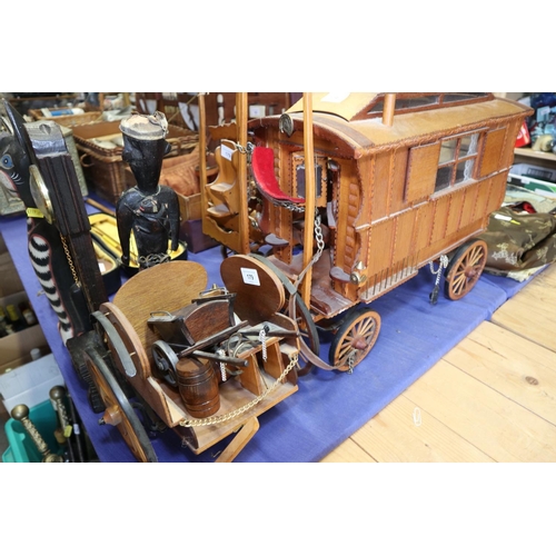 179 - A wooden scale model carriage, other carriages, a model of a cat and other items