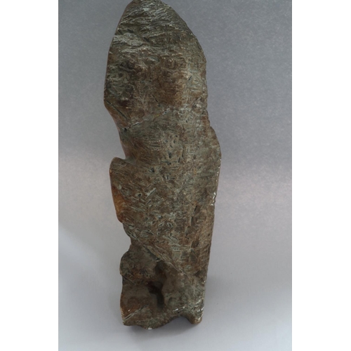 196 - A carved soapstone door stop?, in the form of a man's head, 23 1/2