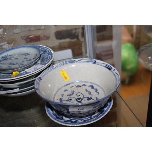 62 - A Chinese blue and white bowl with landscape, figure and floral decoration, 6 1/2