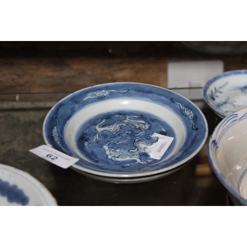 62 - A Chinese blue and white bowl with landscape, figure and floral decoration, 6 1/2