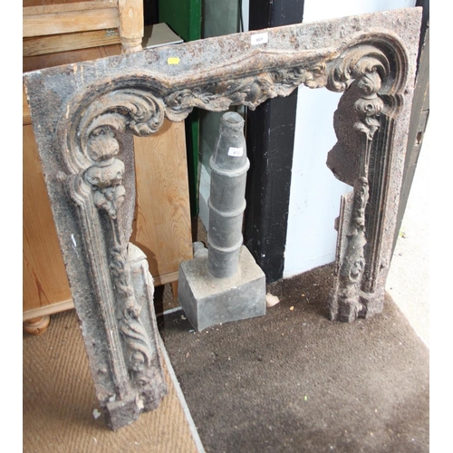 669 - A cast iron fireplace surround, 38