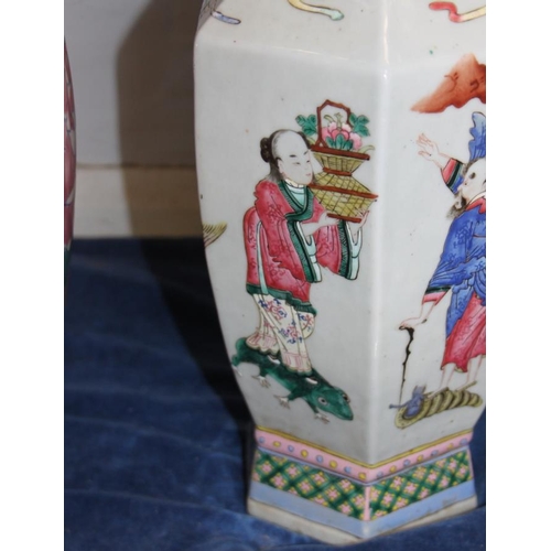 67 - A Chinese porcelain hexagonal famille rose vase with immortal decoration, 16.5