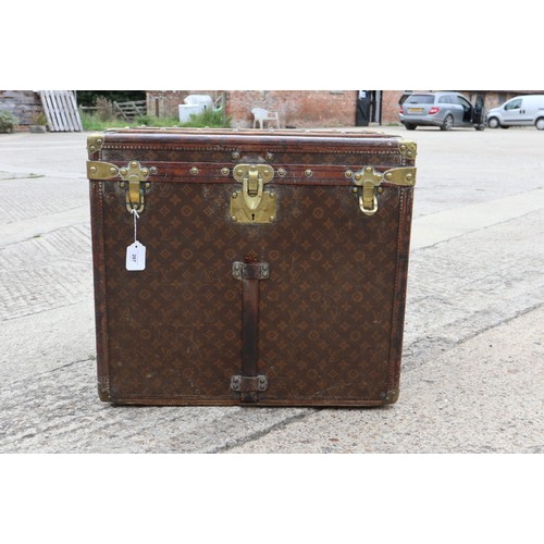 207 - A late 19th century Louis Vuitton printed canvas, leather and brass mounted wooden bound travel trun... 