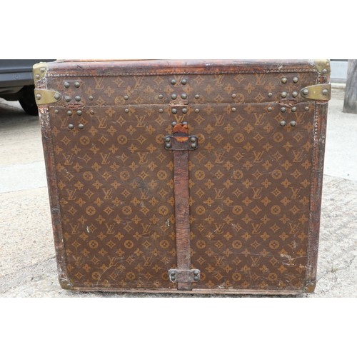 207 - A late 19th century Louis Vuitton printed canvas, leather and brass mounted wooden bound travel trun... 