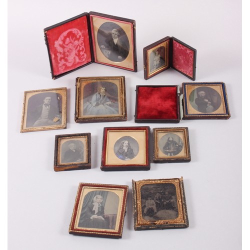 414 - A pair of mid 19th century photographic portraits of a man and woman, in union cases with gilt borde... 