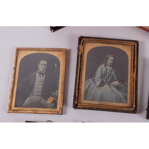 414 - A pair of mid 19th century photographic portraits of a man and woman, in union cases with gilt borde... 