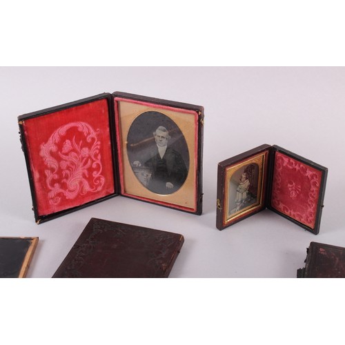 414 - A pair of mid 19th century photographic portraits of a man and woman, in union cases with gilt borde... 