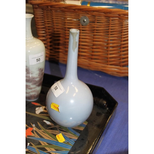 50 - A pale blue sprinkler vase, 7 1/2