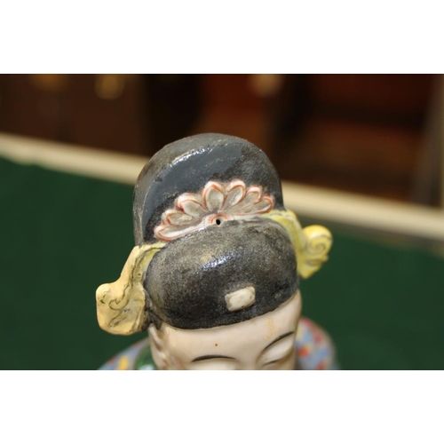 64 - A Canton enamel figure of the God of Fortune, 10