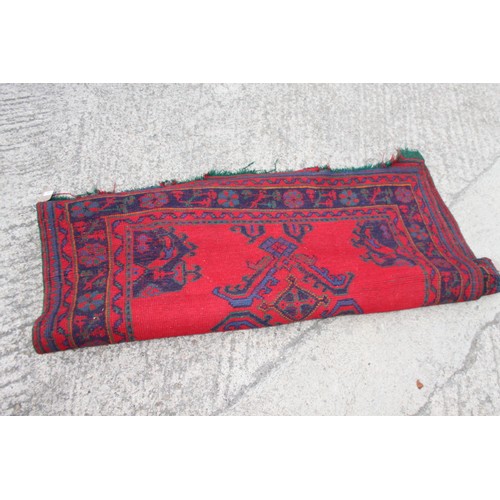 666 - A turkey carpet of traditional design in shades of red, green, blue and yellow, 92