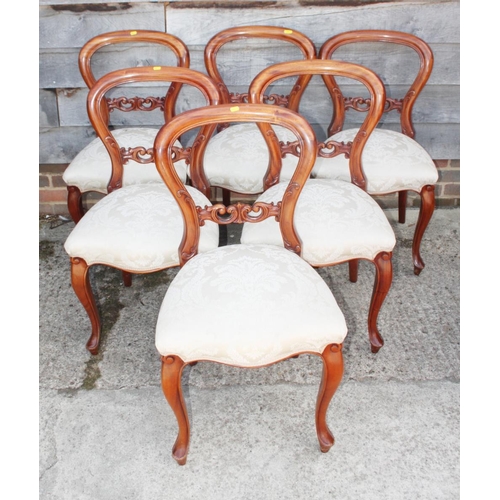 526 - A set of six late Victorian design carved mahogany loop back dining chairs with stuffed over seats, ... 