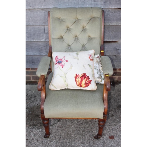 527 - A late 19th century polished as walnut scroll arm chair, upholstered in a sage green fabric, on turn... 