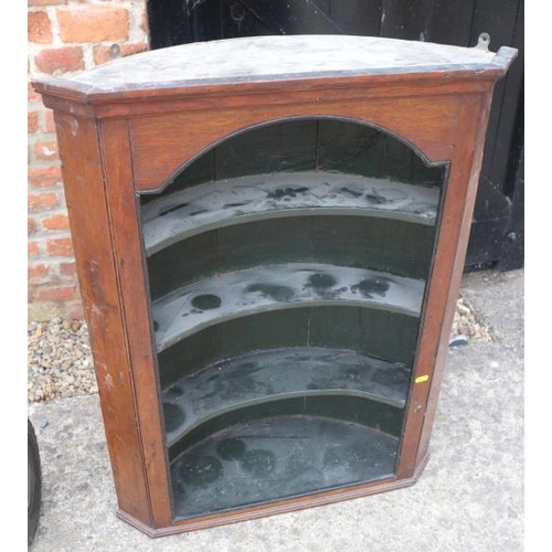 530 - A late Georgian oak corner alcove with curved shelves, 27