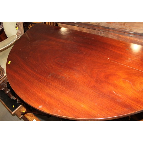 532 - A 19th century mahogany semicircular side table, on chamfered and moulded supports, 46