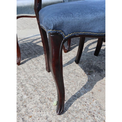 536 - A Harlequin set of six William IV rosewood loop back dining chairs with stuffed over seats, on cabri... 