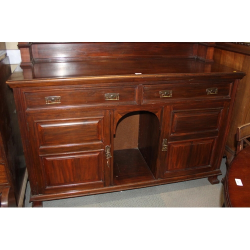 537 - A Victorian walnut mirror back dresser with flanking columns over two drawers and cupboards, on brac... 