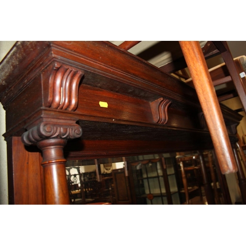 537 - A Victorian walnut mirror back dresser with flanking columns over two drawers and cupboards, on brac... 