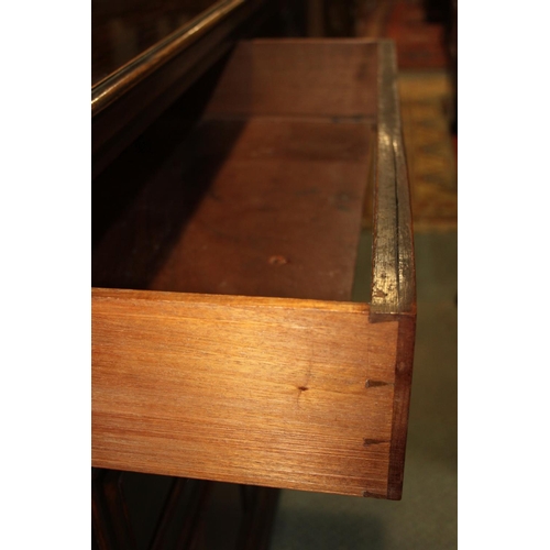 537 - A Victorian walnut mirror back dresser with flanking columns over two drawers and cupboards, on brac... 