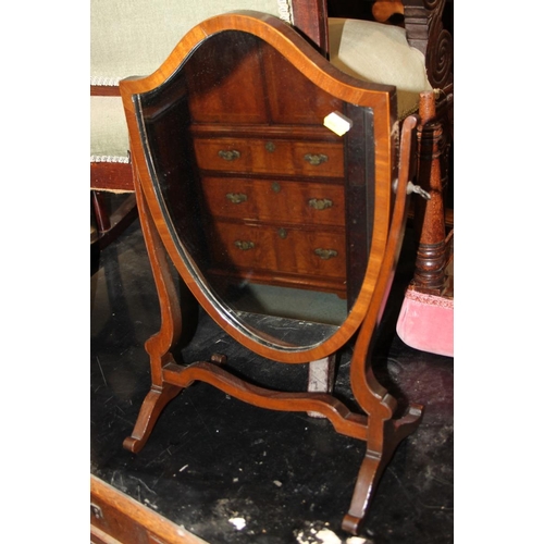 588 - A late 19th century mahogany and box strung shield-shaped swing frame toilet mirror, on skeleton sta... 