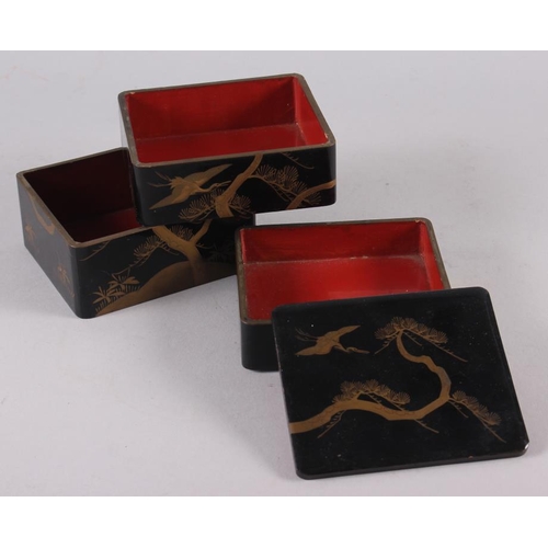 103 - A Japanese scholar's lacquered desk accessory, a lacquered three-compartment box, a document box and... 