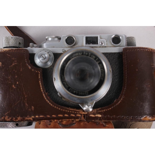 112 - A Leica D R P Rangefinder camera, No 234416, summar f=5cm 1:2 No 350906 lens, in leather case