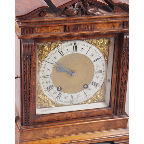 117 - A Lenzkirch mantel clock with brass and silvered dial, in architectural case, 13