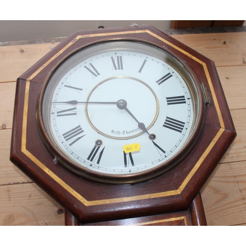 122 - A 19th century Seth Thomas drop dial wall clock, 22