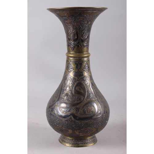 147 - A 19th century silver and copper inlaid waisted vase, 11