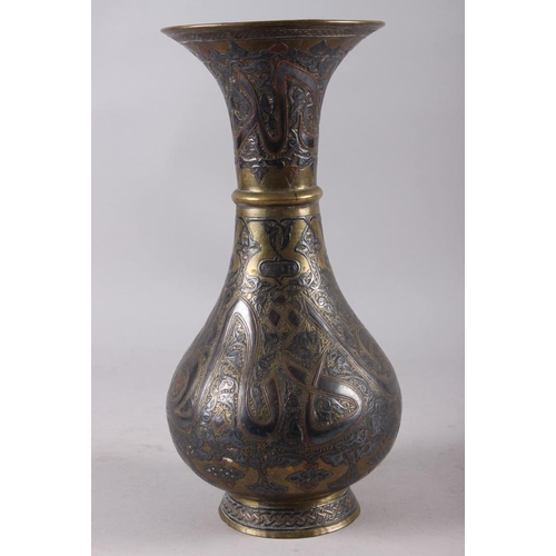 147 - A 19th century silver and copper inlaid waisted vase, 11