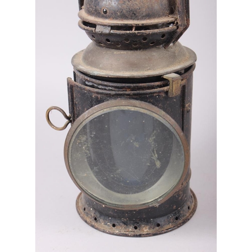 212 - A japanned railway lamp, manufactured by C Polkey, Birmingham