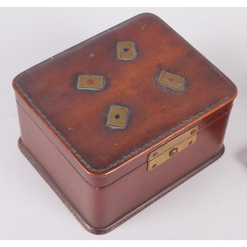 214 - A leather playing card box, two bezique markers, a cased set of four sterling silver bridge pencils ... 