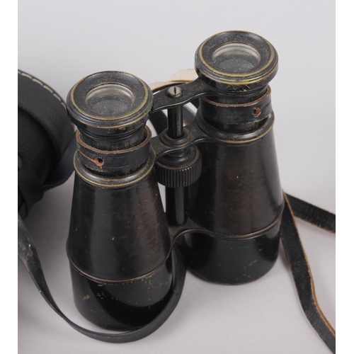 216 - A piccolo, by Muller, in fitted case, and a pair of binoculars, in case