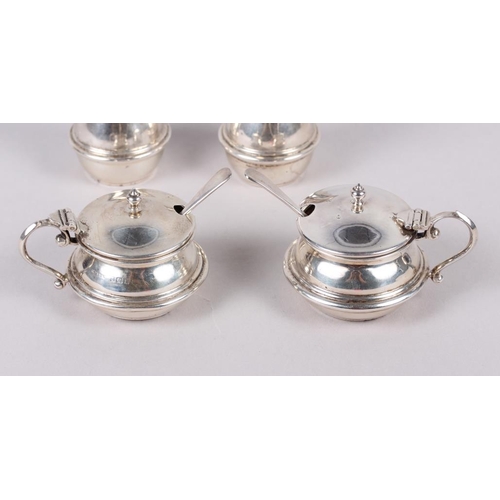 286 - Two silver mustard pots and a pair of silver pepper pots, 4.7oz troy approx