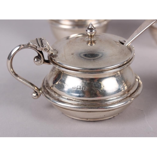 286 - Two silver mustard pots and a pair of silver pepper pots, 4.7oz troy approx