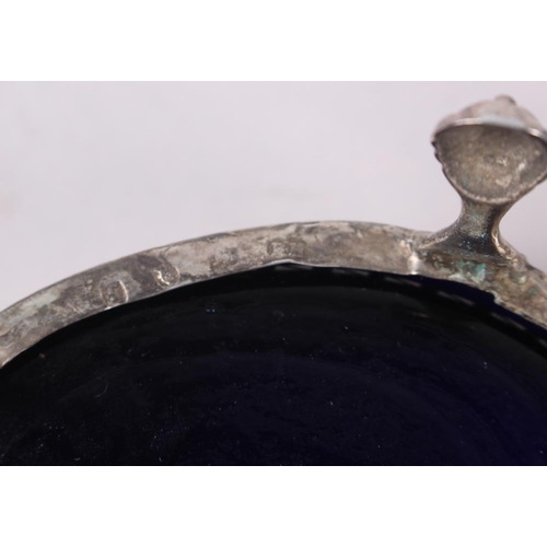 319 - A pair of George III oval silver salts with pierced sides engraved swags, on ball and claw supports,... 