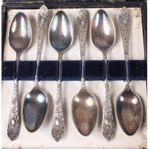 323 - A cased set of six silver apostle teaspoons with matching tongs and two other silver plated sets of ... 